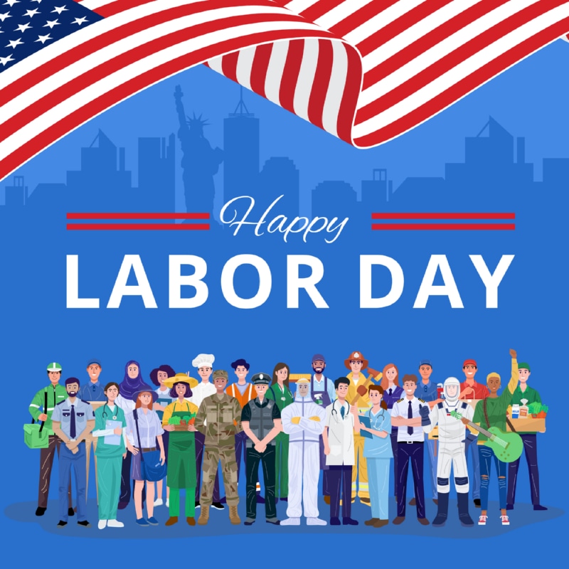 Illustration of diverse workers—including police, nurses, firefighters, construction workers, doctors, and astronauts—standing together under a waving US flag with the text Happy Labor Day and a city skyline in the background.