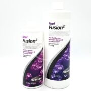 The SEACHEM REEF FUSION 2 set, featuring two bottles to maintain calcium and alkalinity in aquariums, boasts a chic white and purple design with coral imagery. Available in 500 mL and 1 L sizes, its ideal for any aquatic enthusiast.