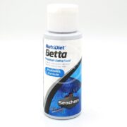 The SEACHEM NUTRIDIET BETTA FOOD 30 G bottle, capped in white and labeled as Premium Betta Food, features a blue betta fish. It highlights a Probiotics Formula and provides 1 ounce of premium nutrition for bettas.