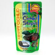 The 57g HIKARI Cichlid Staple Baby Float comes in a vibrant green and orange bag with a fish image, promoting growth and color benefits for your little swimmers with its floating design.
