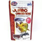 The HIKARI JUMBO CARNISTICKS 6.37 OZ (182G) package features colorful fish graphics and is ideal for large carnivorous fish, offering protein-rich, high-calorie floating sticks for a nutritious meal.