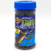 A clear plastic jar with a blue lid labeled ZOO MED AQUATIC FROG FOOD features a frog in water. The 2 oz (56.6 g) container holds micro pellets for frogs and tadpoles.