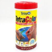 The 2.65 oz TetraColor Tropical Granule XL fish food is packaged in bright yellow with a red lid, showcasing fish images and benefits like Complete Diet, Boosts Color, and Clean & Clear Water Formula for vibrant aquatic life.