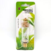 The UP AQUA BRASS CO2 BUBBLE COUNTER is ideal for aquariums, encased in clear plastic and mounted on a green and white card with text and bubble graphics, offering functionality and style.