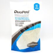 The SEACHEM DUOPAD, safe for acrylic, offers non-scratch, dual-surface cleaning for glass and acrylic. Featuring micro abrasive technology and a blue and white design, it prominently displays the Seachem logo at the bottom.