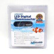 The LIFEGARD LED DIGITAL THERMOMETER packaging, perfect for aquarium enthusiasts, features a vibrant blue LED display. A 2012 gold award badge stands out prominently, with a cartoon clownfish illustration adorning the bottom right corner.