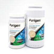 Two SEACHEM PURIGEN synthetic filter resin containers are displayed—a smaller and a larger one—both featuring blue graphics and text promoting their use in marine and freshwater filtration.