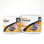 Two white containers of SEACHEM NUTRIDIET TROPICAL FLAKES, featuring fish images and labeled for freshwater community fish, display a probiotic-enhanced formula.