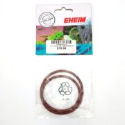 The EHEIM 7273118 sealing o-ring for 2213, priced at $19.99, includes two brown rubber rings. The package features images of vibrant aquatic plants and fish, and a recyclable symbol on the plastic.