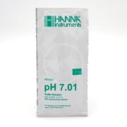 A HANNA PH CALIBRATION SOLUTION PACKET, designed for accurate pH 7.01 calibration, features sleek silver packaging with the brand logo and product name, containing a handy 20 mL solution.