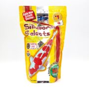 The HIKARI SILKWORM SELECTS TREAT 17.6 OZ package, featuring a yellow bag with a red and white koi fish image, serves as a Daily Diet Growth Booster with 50% silkworm content, from Japans Best Selling Brand.