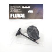 The clear plastic packaging contains a FLUVAL X06 PRIMER KIT A20021 for aquarium use. It includes a black mounting bracket, suction cup, and multilingual Replacement Part labels. The price label shows $11.99.