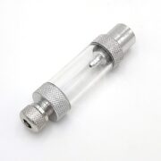 The SR AQUARISTIK CO2 BUBBLE COUNTER SCREW ON is a metal pneumatic air filter with a transparent cylindrical midsection showcasing an internal component. Textured ends ensure a secure grip, all elegantly displayed on a pristine white surface.