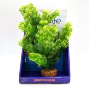 The artificial Aqualife Green Cabomba Plant 8 PP1733 features vibrant green fronds that mimic the lush beauty of its natural counterpart. It is displayed in a blue stand labeled Plant Scapes, set against a backdrop with a blurred image.