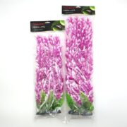 Two plastic bags hold AQUATOP PLANT HYGRO PINK WHITE aquarium plants. The right bag is larger. These artificial plants, with green bases, resemble underwater vegetation and are perfect for aquariums adding a splash of color and style.