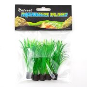 The UT TALL GRASS MINI PLANT 5 PK includes five artificial aquarium plants, each featuring green grass-like leaves and sturdy black bases, packaged under the label Natural Aquarium Plant with rocky landscape imagery.