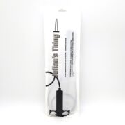 A minimalist white package showcases a bold black syringe silhouette with JULIANS THING in vertical text. The JULIANS THING MULTI-USE TOOL combines elegance and versatility against its crisp backdrop.