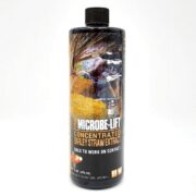 The MICROBE LIFT BARLEY STRAW EXTRACT, labeled with barley straw bales and koi fish for ponds, comes in a 16 fl. oz. (473 ml) bottle, ideal for clean and healthy water.