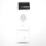 A white plastic aquarium cleaning tool called aqua blade M from Continuum is packaged in a clear plastic bag, with the handle and cleaning blade visible. The label is black and white.