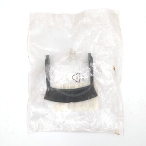 A black metal bracket is sealed inside a clear, crinkled plastic bag with a recycling symbol printed on it, photographed on a plain white background.
