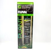 A box of Fluval Plant Spectrum LED light, 6500K, 22 watts, for 15–24 inch tanks. The packaging highlights Bluetooth control, app connectivity, and features designed for aquatic plant growth.