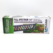 A rectangular box for a Lifegard Aquatics Full Spectrum 10 LED light, showing colorful lights on a fish tank and green plants. The box is mostly white with green and blue accents and product information.