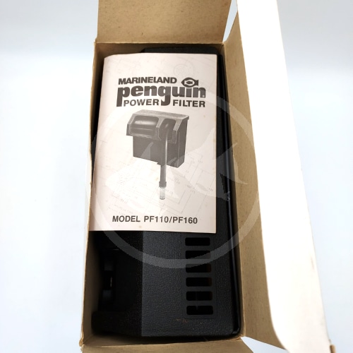 A Marineland Penguin Power Filter, model PF110/PF160, is shown inside a open cardboard box with an instruction manual placed on top of the filter.