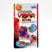 Front of a Hikari Vibra Bites fish food package, featuring colorful images of betta fish and bold text highlighting benefits for smaller fish. The package emphasizes a Vibrant Color Formula and Worm-Like Shape for easy feeding.