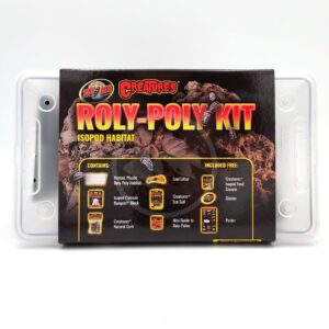 A Zoo Med Creatures Roly-Poly Kit box sits on a clear plastic container. The kit is for creating an isopod habitat and lists included items such as a vented habitat, leaf litter, cork, and a care guide.
