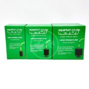 Three green boxes of Aquarium Co-Op sponge filters (Nano, Medium, and Large) are displayed side by side, each labeled with recommended tank sizes and product features for aquarium use.