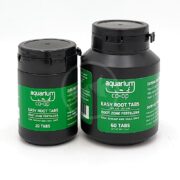 Two black containers of Aquarium Co-Op Easy Root Tabs fertilizer, one labeled 20 tabs and the other 60 tabs, both with green labels and black lids, placed side by side on a white background.