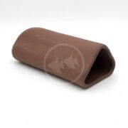 A brown, triangular, hollow ceramic cave with smooth surfaces, designed for use in aquariums or terrariums, is shown on a plain white background.