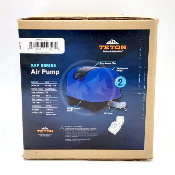 A brown cardboard box displays the TETON DIAPHRAGM POND AIR PUMP with a blue label featuring a pump image, product features, specifications, and a barcode sticker on the top left corner.