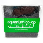 A coarse black sponge pad in clear packaging with a green label reading aquarium co-op and COARSE SPONGE PAD, along with fish and plant graphics.