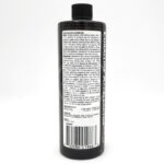 A black bottle labeled Coralline Accelerator stands upright, displaying detailed instructions, guidelines, and ingredient information in white text on the back label. A barcode is visible at the bottom of the label.