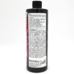 A black bottle labeled Brightwell Aquatics stands upright. The back label contains detailed white text about the product, instructions, and ingredients, but the front label is not visible.