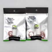 Two packets of CO2 Art replacement membranes for diffusers, each containing a white cylindrical part and several red O-rings, are displayed against a white background. The packaging is labeled CO2 essentials.