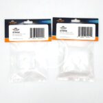 Two clear plastic bags with Teton branding contain replacement air filters, model numbers 873020 and 873048. Each bag has a barcode and product information printed above the filter inside.