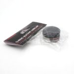 A 1.5 oz black AQUATOP O RING SILICONE LUBRICANT, partially wrapped in clear plastic, sits next to its black and red label packaging on a white surface.