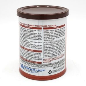 A cylindrical container of Hikari freeze-dried fish food is shown with detailed product information, ingredients, guaranteed analysis, and feeding instructions printed in English on the label.
