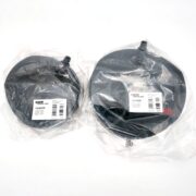 Two black rubber inner tubes in transparent plastic packaging with labels showing product codes and barcodes, placed on a white background.