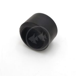 A black, cylindrical rubber cap or stopper with an open end, placed on a white surface.