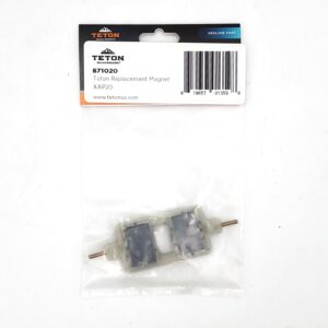 A packaged Teton Replacement Magnet (model 871020), visible through clear plastic. The label displays the Teton logo, product name, barcode, and website on a white and orange background.