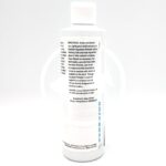 A white bottle with a white cap, shown from the back, displaying directions for use and safety information in black text. The product appears to be aquarium-related polish or cleaner.