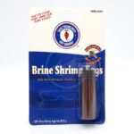 A package of San Francisco Bay Brand Brine Shrimp Eggs for fish food, featuring a small vial of eggs and bold text that reads Hatch Your Very Own Live Fish Food and Baby Brine Shrimp Eggs for Freshwater.
