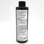 A black plastic bottle labeled Brightwell Aquatics stands upright, showing a white label with dense black text containing instructions, directions, and information about the aquatic product.
