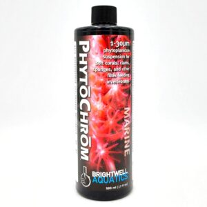 A bottle of Brightwell Aquatics PhytoChrom Marine phytoplankton suspension, featuring a black cap and label with red coral images and white and pink text describing its use for filter-feeding marine invertebrates.
