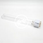 A double-tube UV light bulb with four gold prongs on a white base, resting on a plain white background.