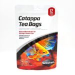 A package of Seachem Catappa Tea Bags for shrimp and betta fish, featuring a vibrant orange and blue fish image and text indicating a 12-pack of natural botanicals to support aquatic health.