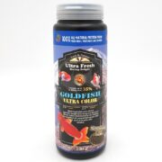 A container of Ultra Fresh Shrimp Delight Goldfish Ultra Color fish food, featuring images of goldfish and bold text highlighting 35% shrimp and 100% all-natural protein. The container is 330 mL / 130 g.